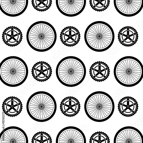 bike wheels and sprocket pattern background vector illustration design