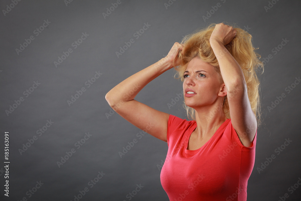 Stressed, frustrated, depressed young woman in pain Stressed, frustrated, depressed young woman in pain