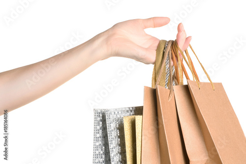 Woman hand with gift bags o...