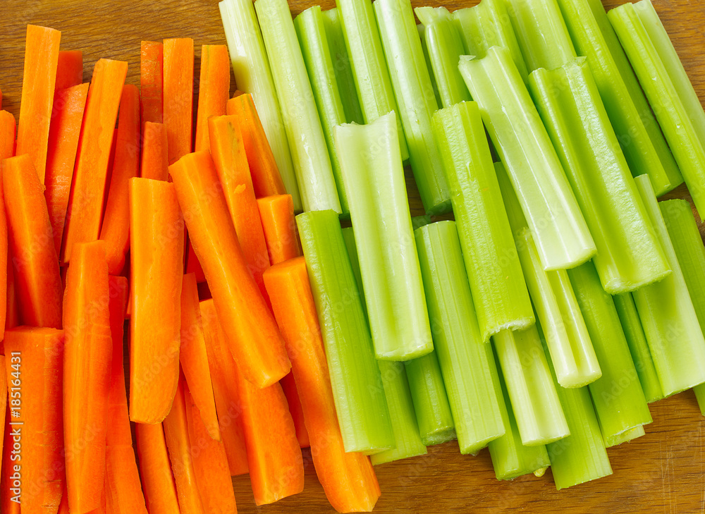 carrot and celery sticks isolated on white carrot and celery sticks isolated on white