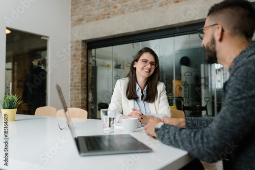 Job candidate kindly speaking with company recruiter