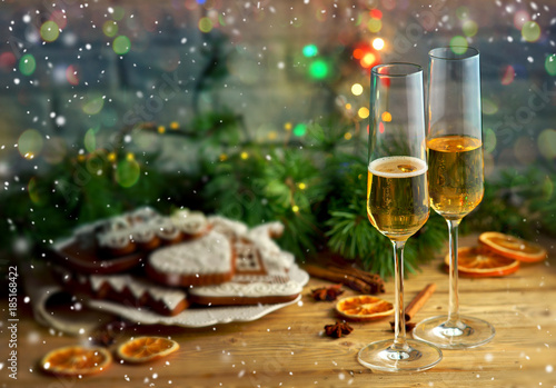 two glasses of champagne on Christmas background