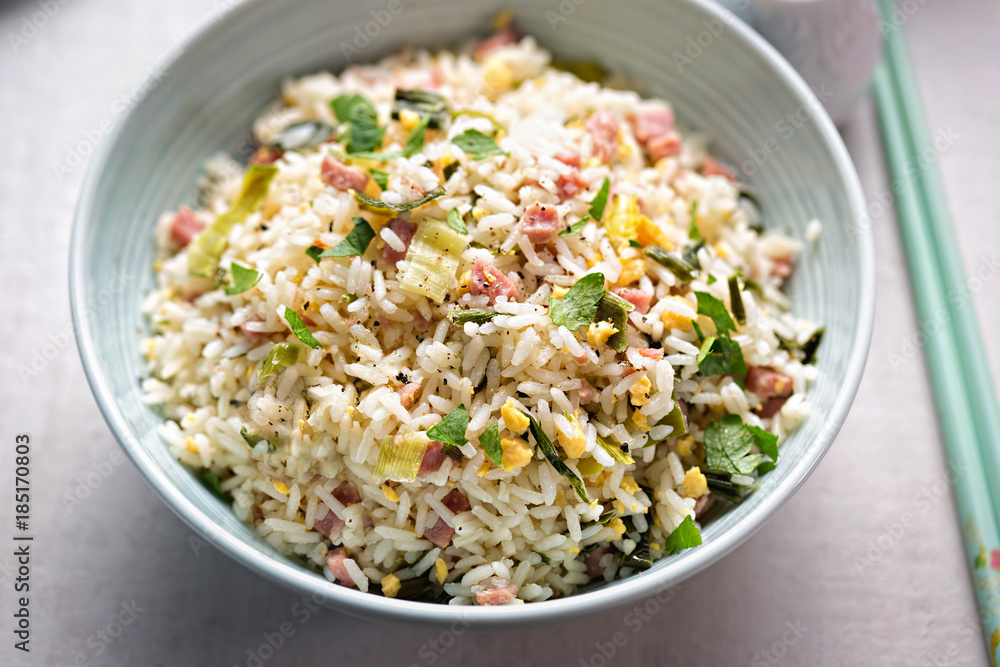 Nasi goring rice. Indonesian style fried rice with pork, egg and leek Nasi goring rice. Indonesian style fried rice with pork, egg and leek