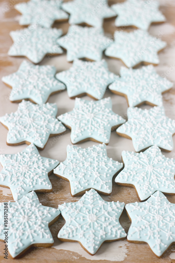 Gingerbread star cookie for Christmas on white background.