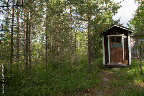 Composting toilet in the nature, typical outhouse in Finland  © nidafoto