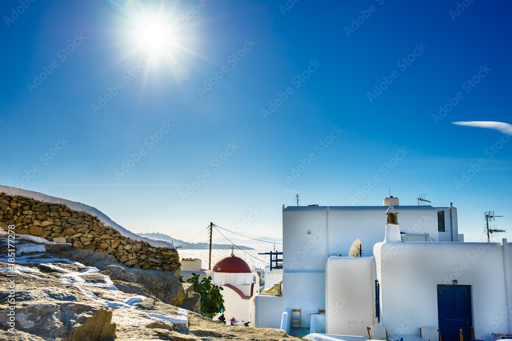 Panoramic view over the town of Mykonos Island in Greece at sunny day. Picture with sun beams egejskiarchitekturaplazaplażapieknypięknyblekitblekitnybłękitbłękitnyniebieskirejseuropagrecjagreckigrecki Panoramic view over the town of Mykonos Island in Greece at sunny day. Picture with sun beams egejskiarchitekturaplazaplażapieknypięknyblekitblekitnybłękitbłękitnyniebieskirejseuropagrecjagreckigrecki