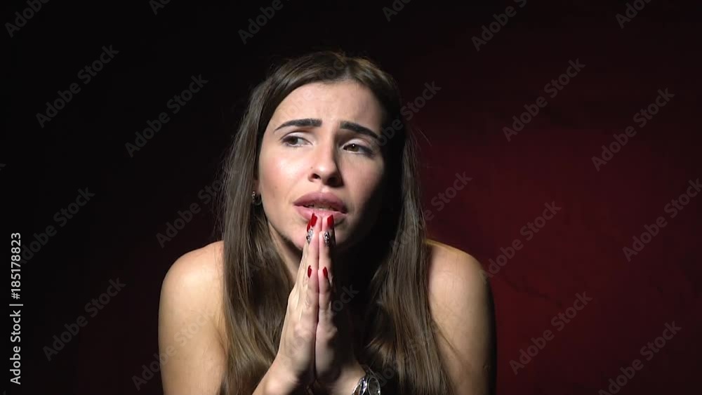 A long-haired woman with a cute face, pretty begs A long-haired woman with a cute face, pretty begs