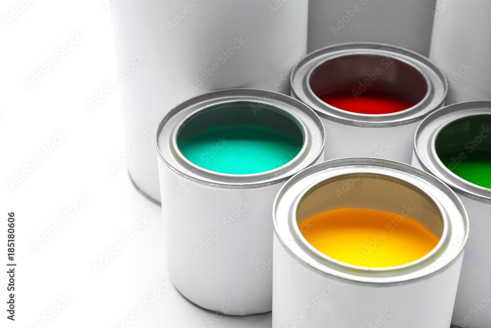Cans with color paints on white background Cans with color paints on white background