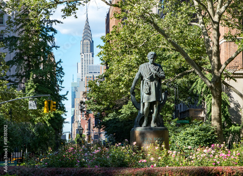 New York City cityscape scene in Gramercy Park with the Midtown Manhattan skyline skyscrapers in the background
