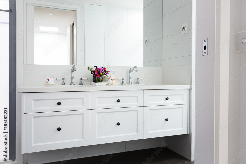 Wall hung vanity in a luxury Hamptons styled bathroom Wall hung vanity in a luxury Hamptons styled bathroom