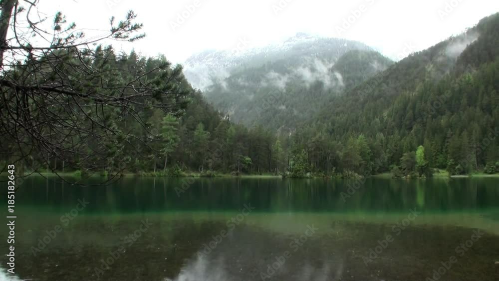 Fernsteinsee emerald green mountain lake at Fernpass in Nassereith Tyrol. Beautiful alpine attractions of nature of Austria. Fernsteinsee emerald green mountain lake at Fernpass in Nassereith Tyrol. Beautiful alpine attractions of nature of Austria.