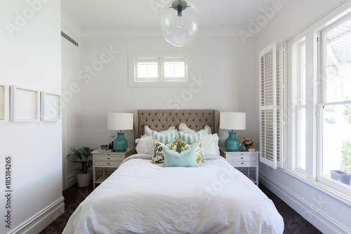 Beautiful feminine country styled master bedroom