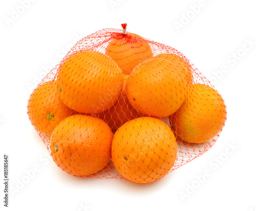 Fresh Oranges in Plastic Mesh Sack on White Background