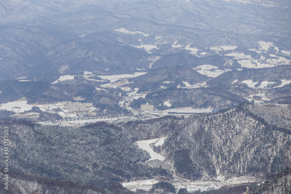 Winter landscapes of South Korea, people in the mountains during blizzards, cable car in winter