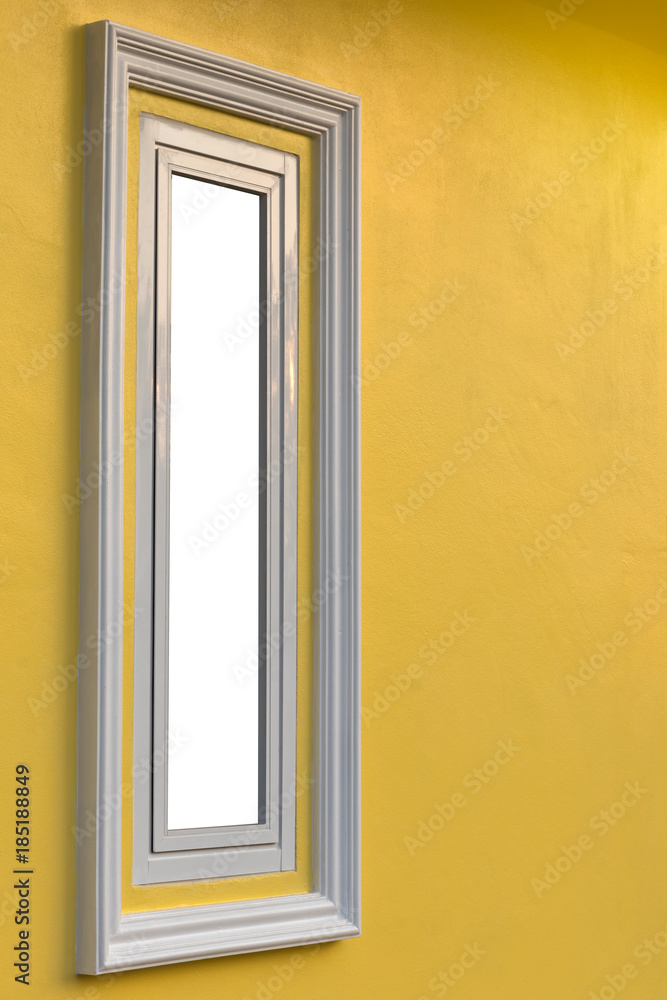 Side window, long white frame with yellow wall. Side window, long white frame with yellow wall.