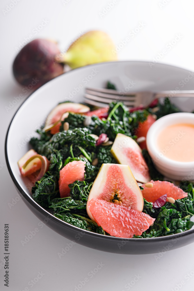 Kale,grapefruit and fig salad bowl. Kale,grapefruit and fig salad bowl.