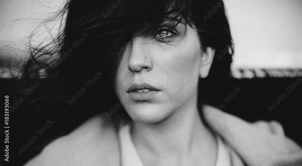 Black and white portrait of a girl crying Black and white portrait of a girl crying