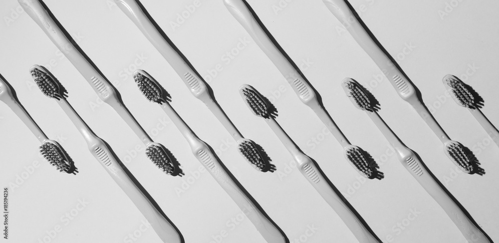 Arranged toothbrushes. Arranged toothbrushes.