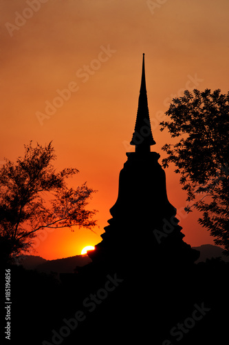 Chedi Sunset at the UNESCO World Heritage Site, Sukothai, Thailand. © Kevin