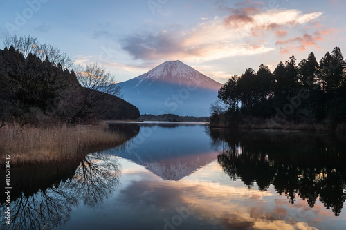Mountain Fuji and Lake Tanumi with beautiful sunrise in winter season. Lake Tanuki is a lake near Mount Fuji, Japan. It is located in Fujinomiya, Shizuoka Prefecture, 