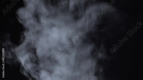 Steam rises on a black background