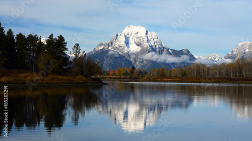 snow on mount moran with reflection © Robert
