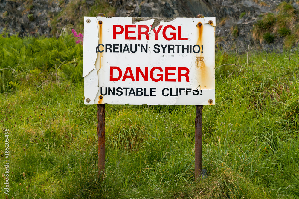 Sign: Danger unstable cliffs (Welsh & English)