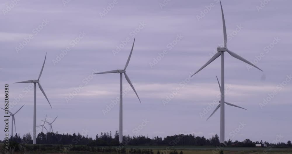 Turbine windmills making electricity - zoom out sped up fast motion Turbine windmills making electricity - zoom out sped up fast motion