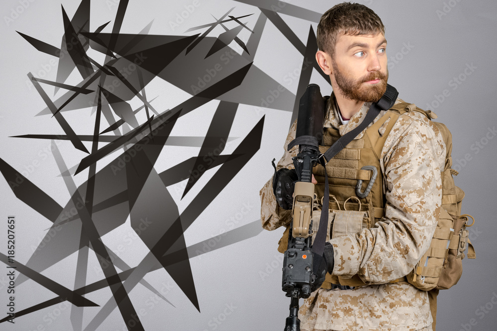 Fototapeta premium Soldier with rifle