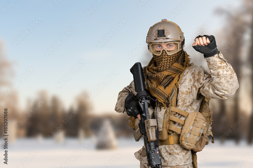Fototapeta premium Modern soldier with rifle