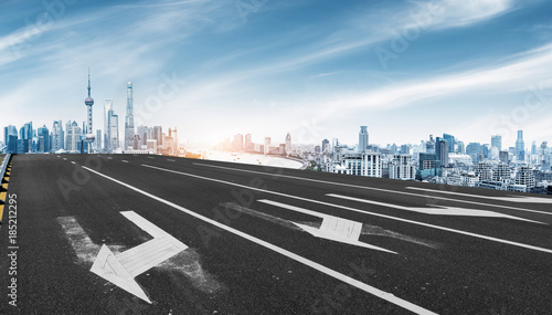 Photography empty asphalt road with cityscape of shanghai in blue sky
