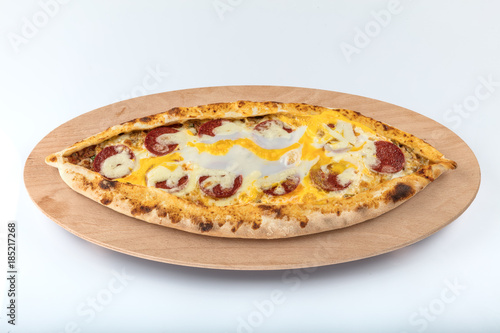 turkish traditional pita pide cheese and meat photo