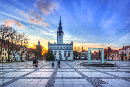 Old town square with historical town hall in Chelmno at sunset, Poland