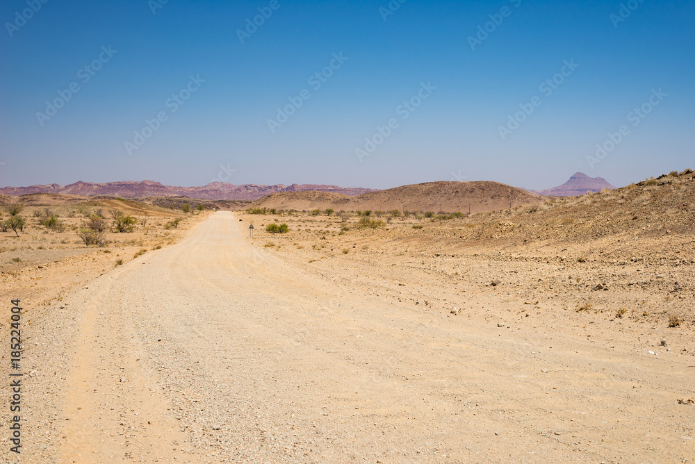 Road trip in the Namib desert, Namib Naukluft National Park, travel destination in Namibia. Travel adventures in Africa.