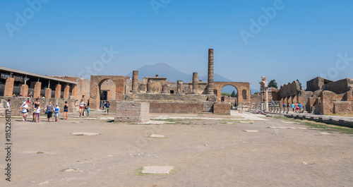 Walking around the ruins and the empty streets of the ancient antique site of Pompeii destroyed by Mount Vesuvius in AD 79, Naples, Campania, Italy, Europe photo