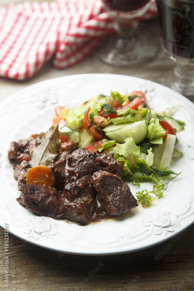 Beef stew with vegetables and red wine