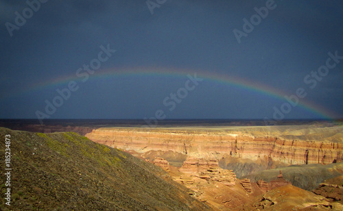 Rainbow over the Charyn canyon. Kazakhstan. Mountains