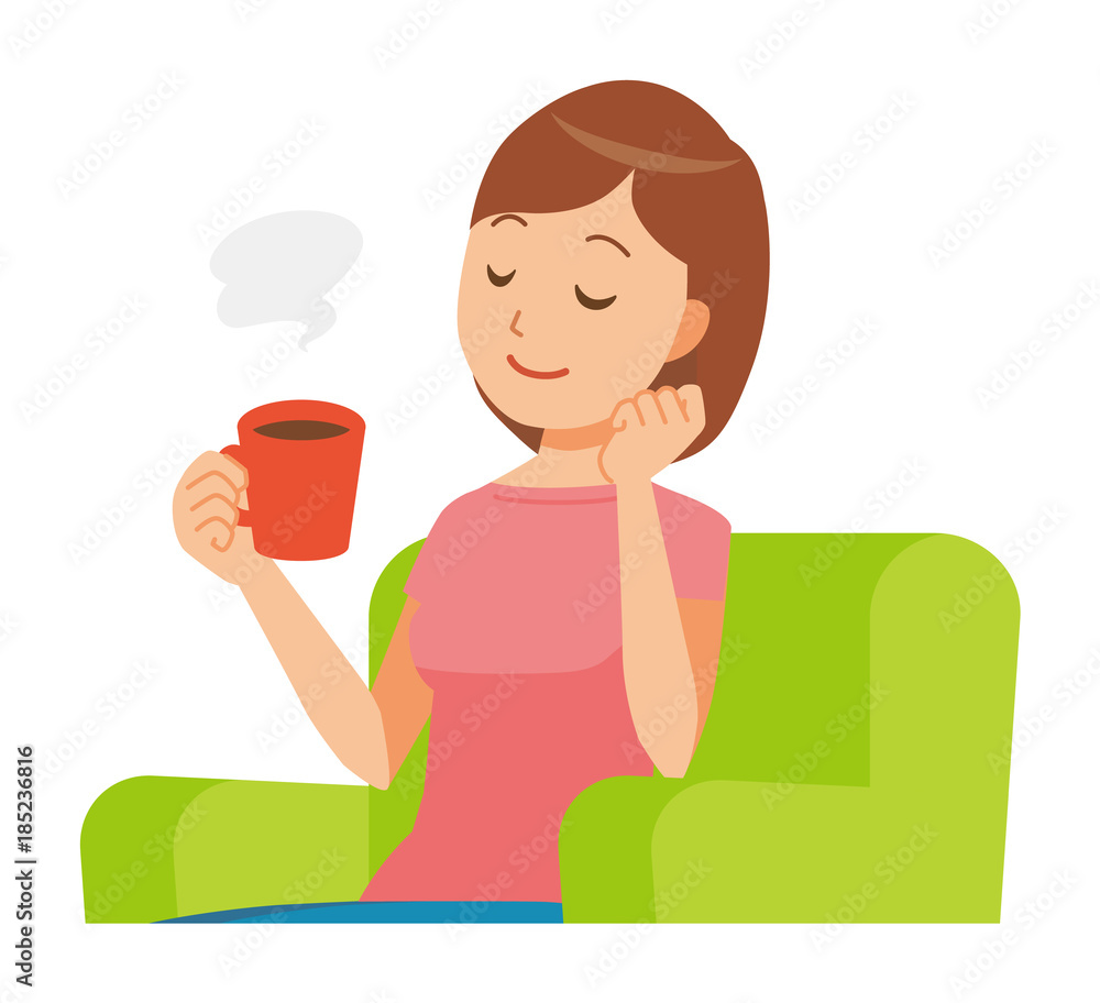 Mommy wearing short sleeve clothes sits on the sofa and is drinking coffee Mommy wearing short sleeve clothes sits on the sofa and is drinking coffee
