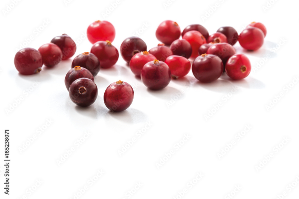 Fresh raw cranberries isolated on white background. closeup Fresh raw cranberries isolated on white background. closeup