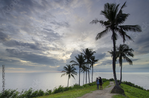 Photography with you at sunset on malimbu hill, lombok island, indonesia