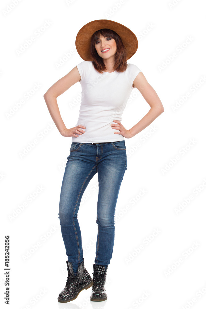 Young Smiling Woman Is Posing In Brown Suede Hat. Young Smiling Woman Is Posing In Brown Suede Hat.