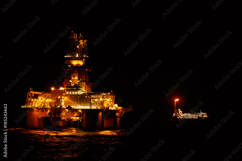 Fototapeta premium Offshore drilling by night time