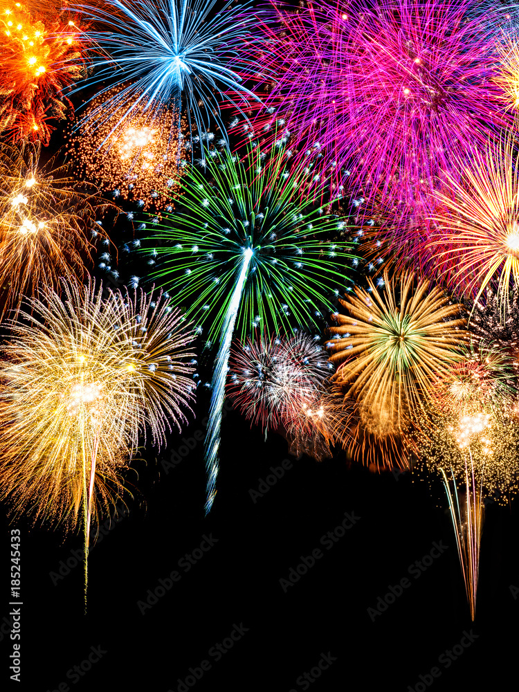Photography Poster Buntes Silvester Feuerwerk vor schwarzem Hintergrund im Hochformat | Wall Art