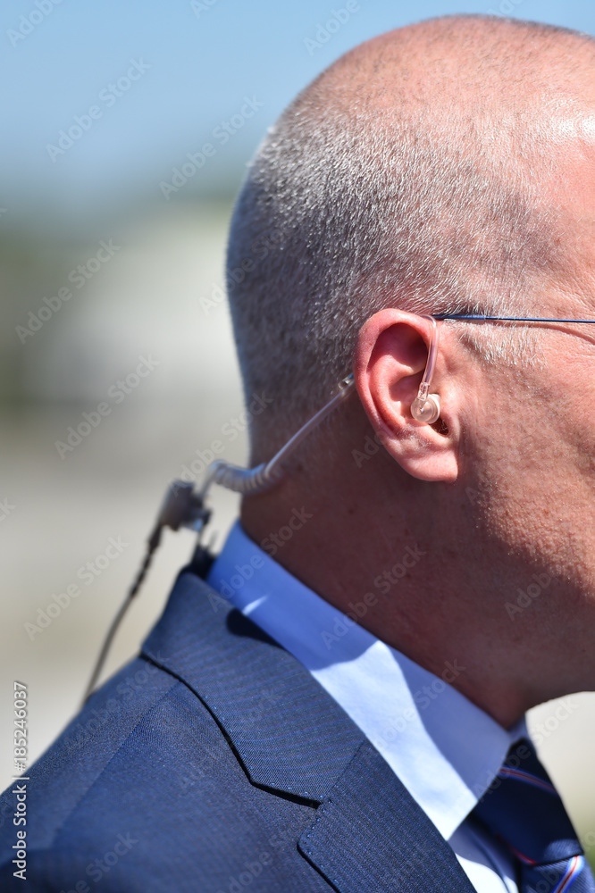 Fototapeta premium Detail with earphone during a live broadcast