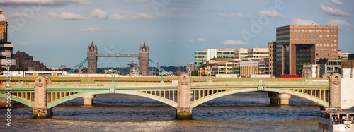 River Thames, London, England. Southwark Bridge and Tower Bridge obscuring London Bridge in between. photo