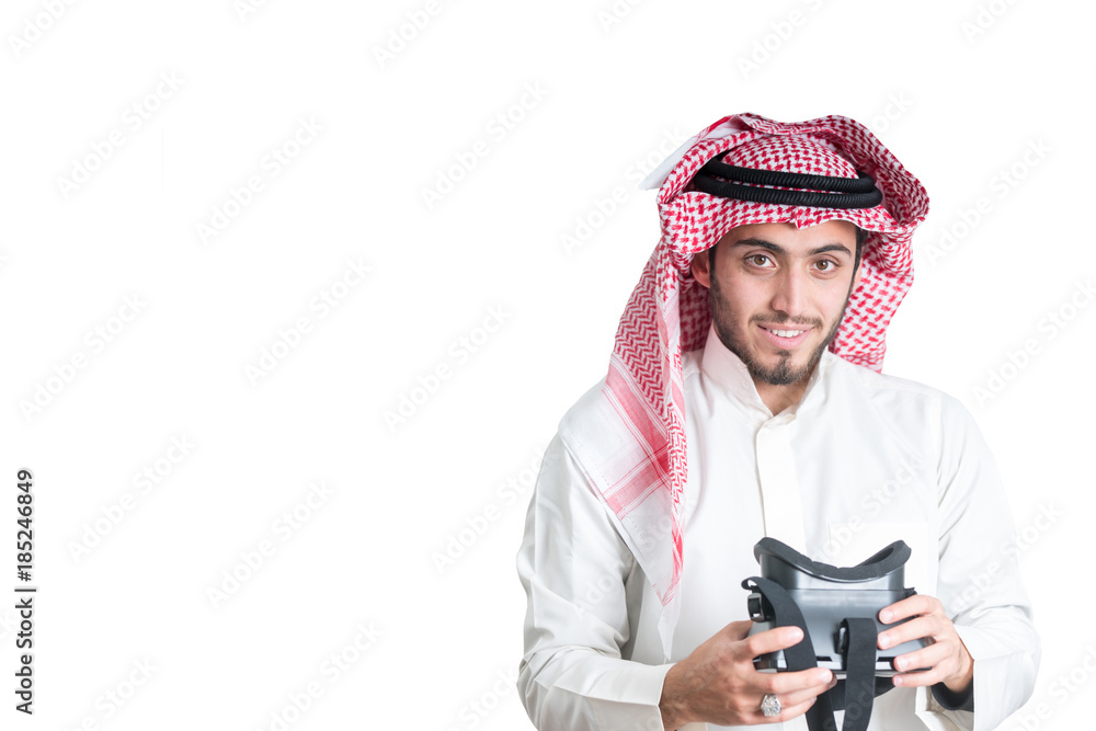 Young muslim guy trying VR glasses. Isolated. Young muslim guy trying VR glasses. Isolated.