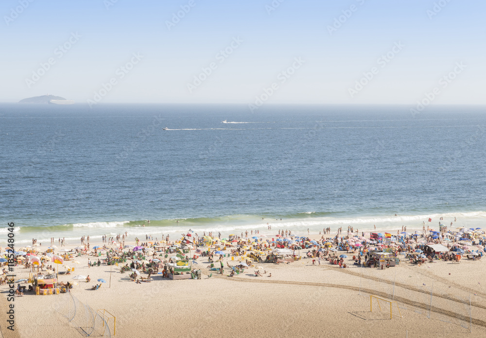 Aerial view of Copacabana Beach in Rio de Janeiro, Brazil on a busy day Aerial view of Copacabana Beach in Rio de Janeiro, Brazil on a busy day
