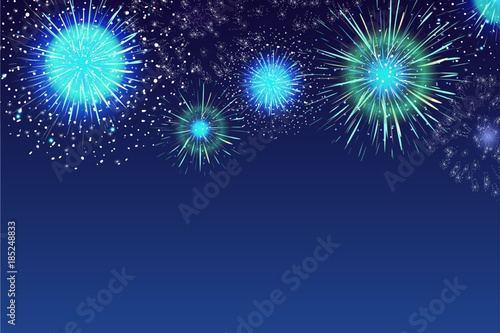 Horizontal blue background with fireworks displaying in dark evening sky