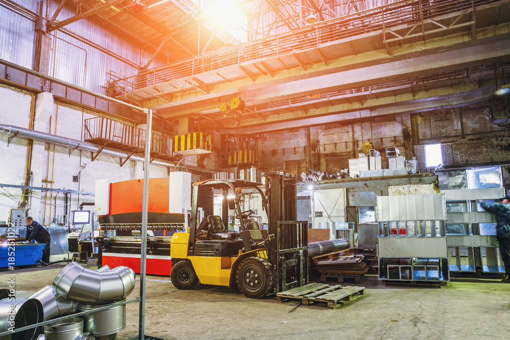 Naklejka premium Industrial workshop or hangar on production of ventilation systems