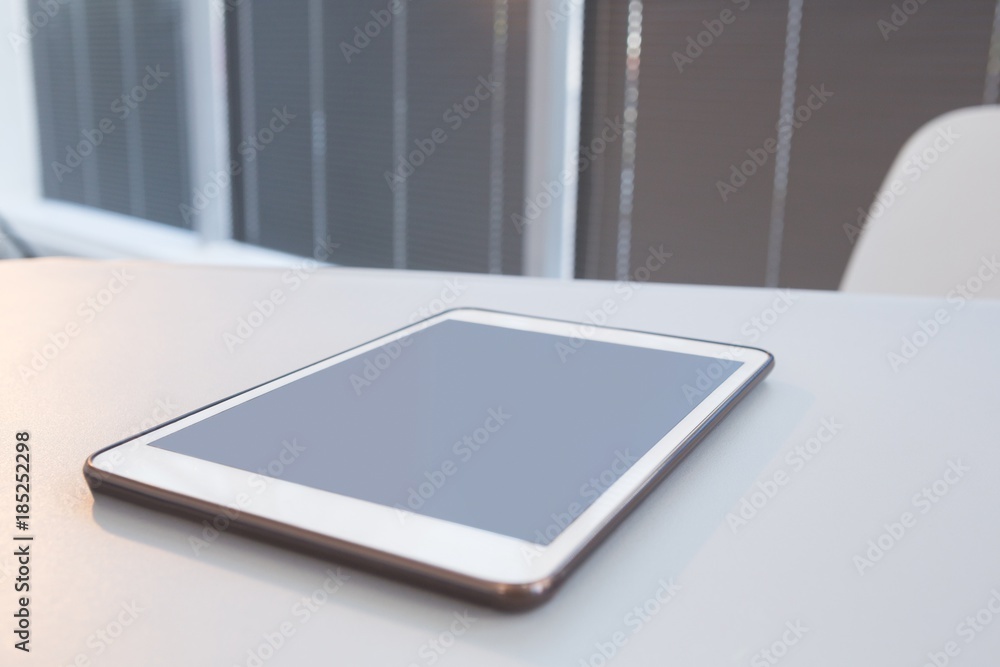 Close-up of digital tablet on desk Close-up of digital tablet on desk